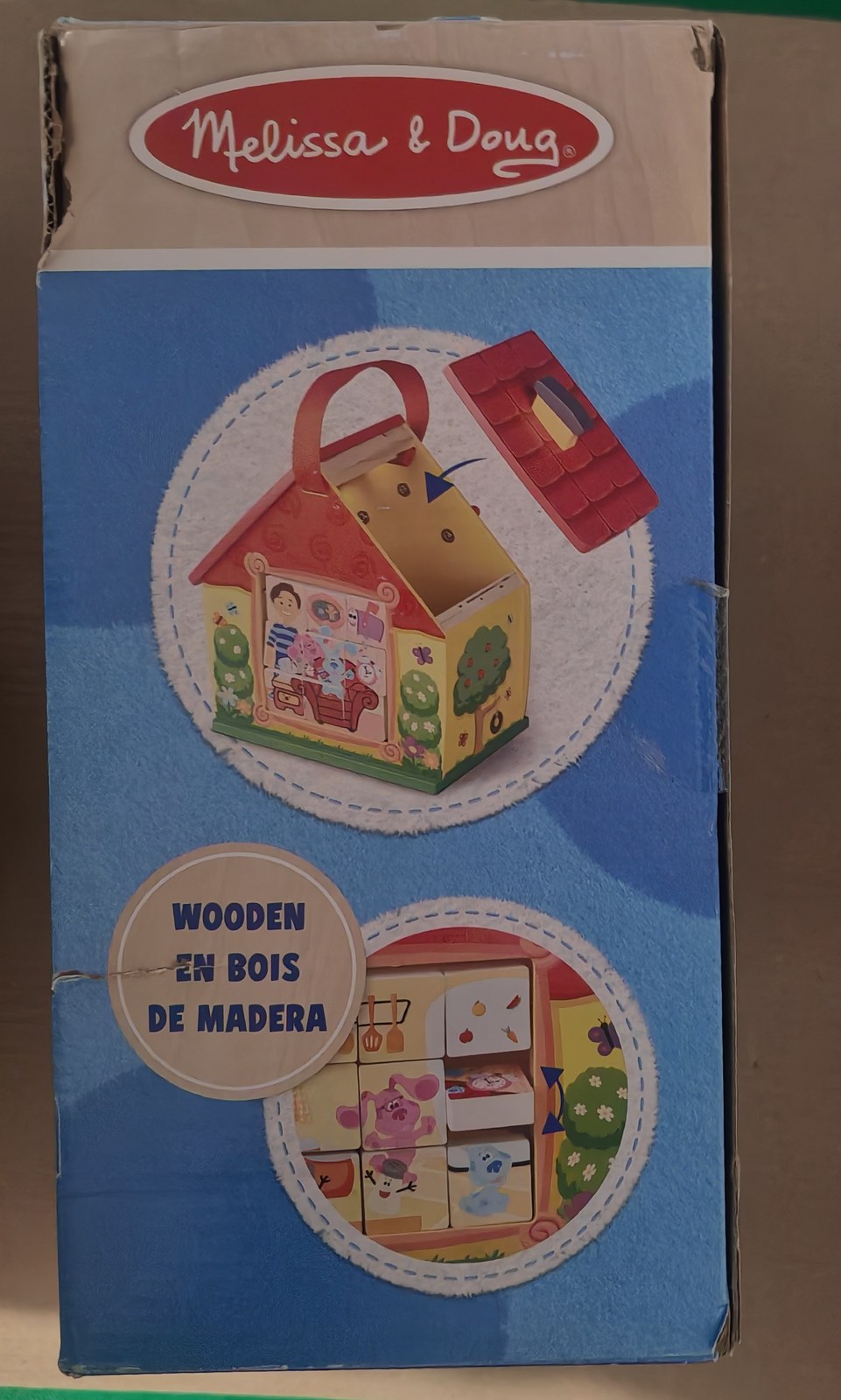 Côté de la boîte de la maison en bois Blue's Clues