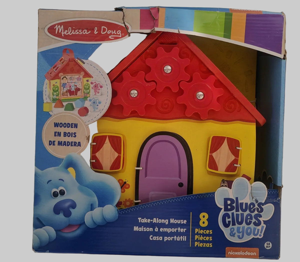 Maison en bois Blue's Clues Melissa & Doug dans sa boîte, coin du haut abîmé