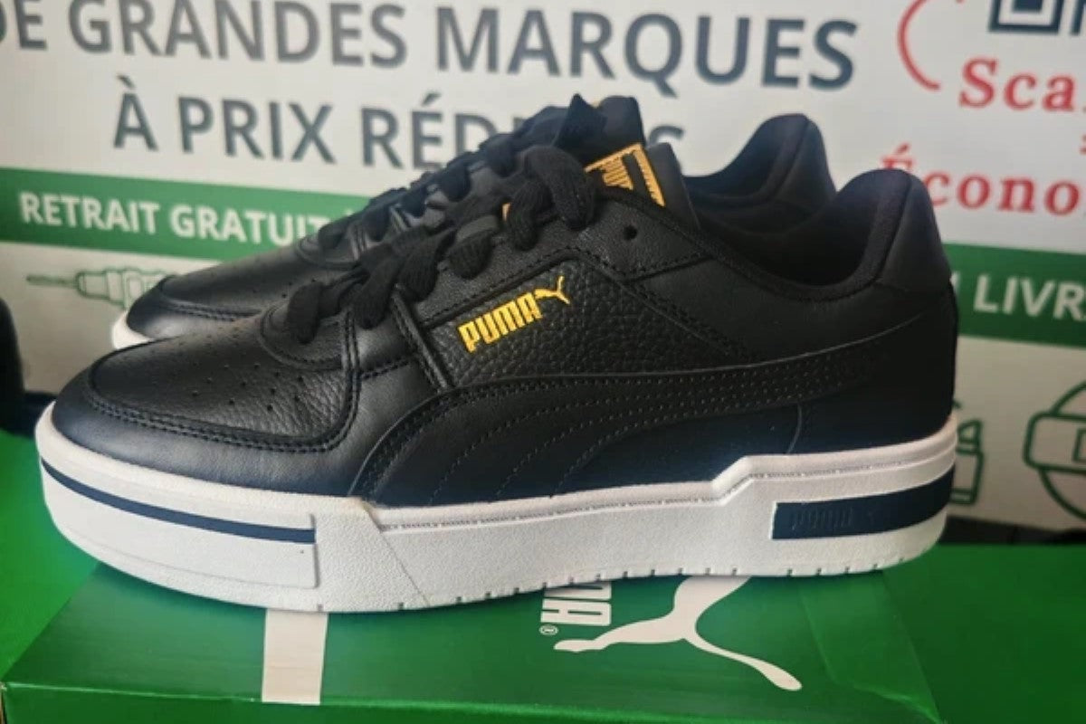 Baskets Puma CA Pro Classic noires sur leur boîte
